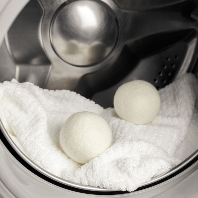 laundry balls sitting at home, in a tumble dryer, ready to go