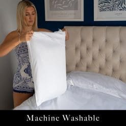 Woman putting her pillow in a white bamboo fabric pillow case