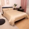 Soft Champagne Bamboo Bedding in a warm toned room of pinks and creams