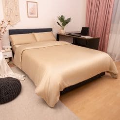 Soft Champagne Bamboo Bedding in a warm toned room of pinks and creams