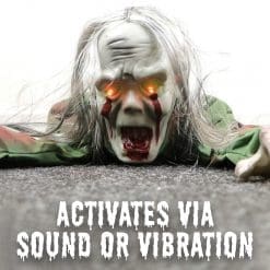 crawling zombie halloween decoration is activated via sound and or vibration