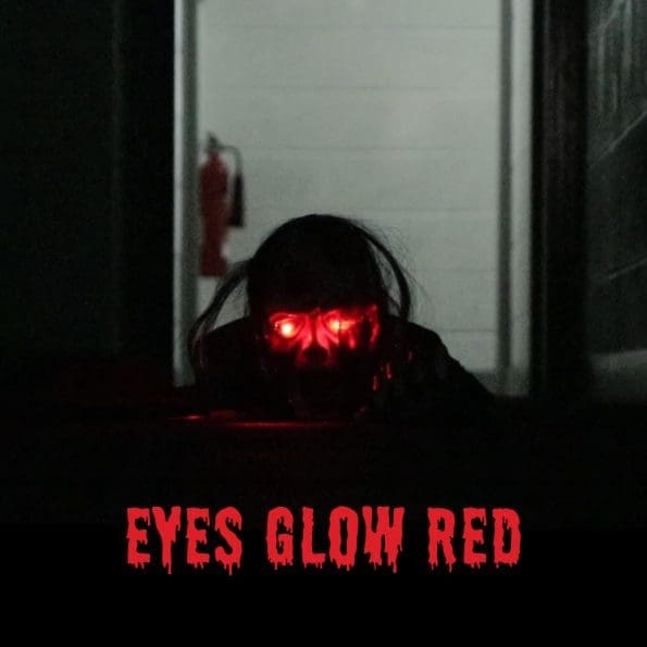 his eyes glow a scary red via 2 small L E D bulbs in his eyes